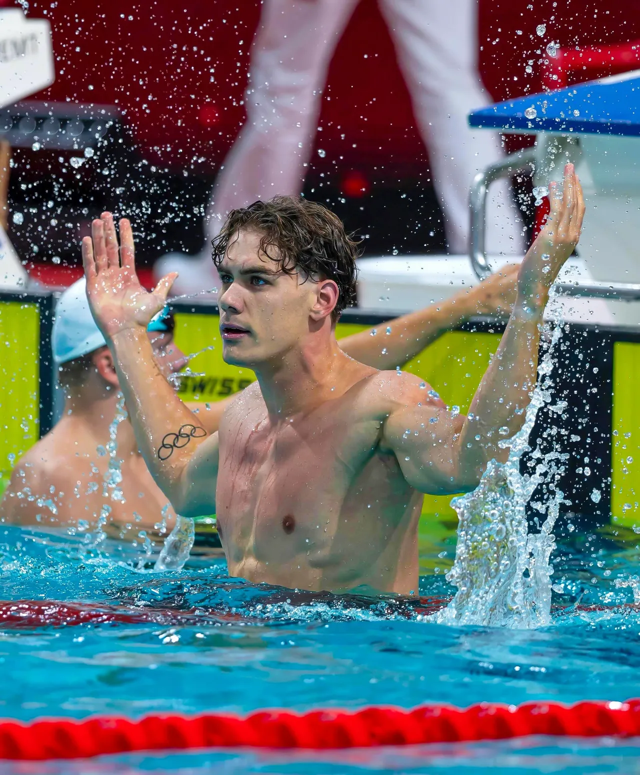 Sean Niewold just after the finish, hands raised — European Swimming Trials 2026